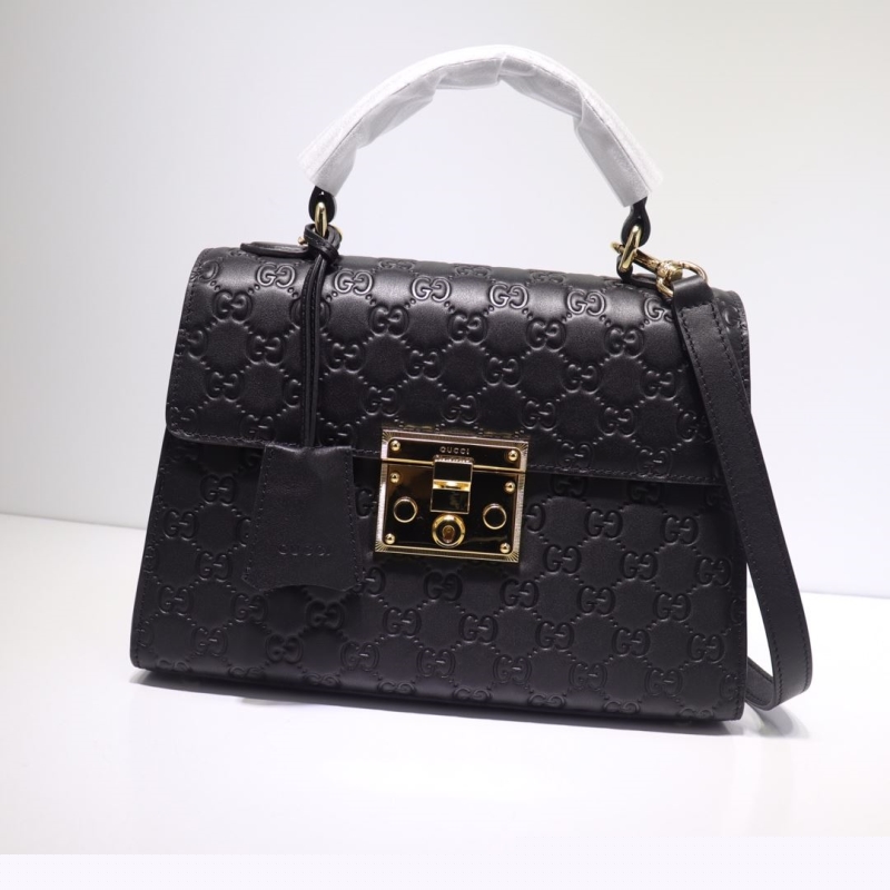 G*u*i top handle bags